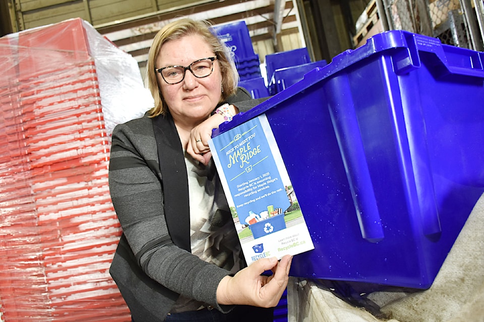 Leanne Koehn with the Ridge Meadows Recycling Society holds a Recycle BC pamphlet informing residents that recycling pickup is changing in the new year. There will be no changes to depot services, she advised. 