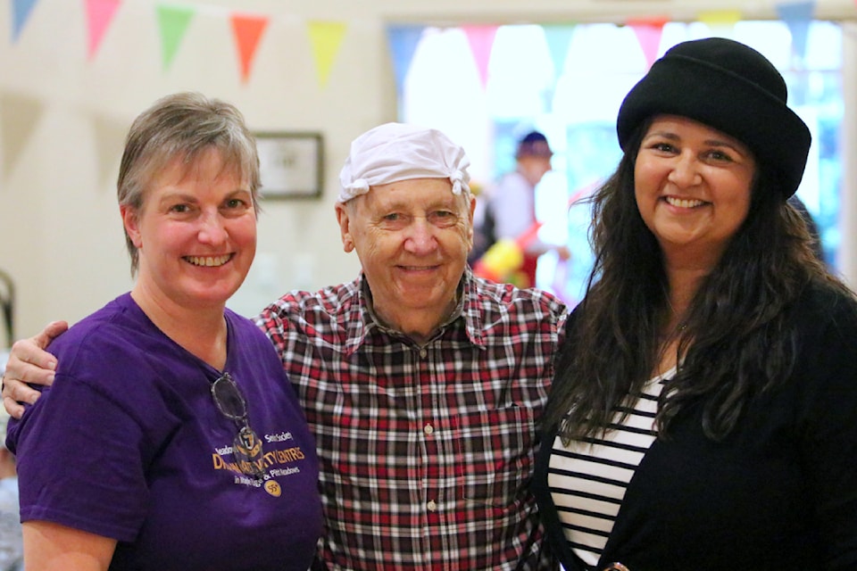 Ridge Meadows Seniors Society activity coordinator Carmen Tischer (left) and executive director Maria Perretta (right) helped organize the 25th anniversary celebration at the Pitt Meadows Seniors Centre on Oct. 10.