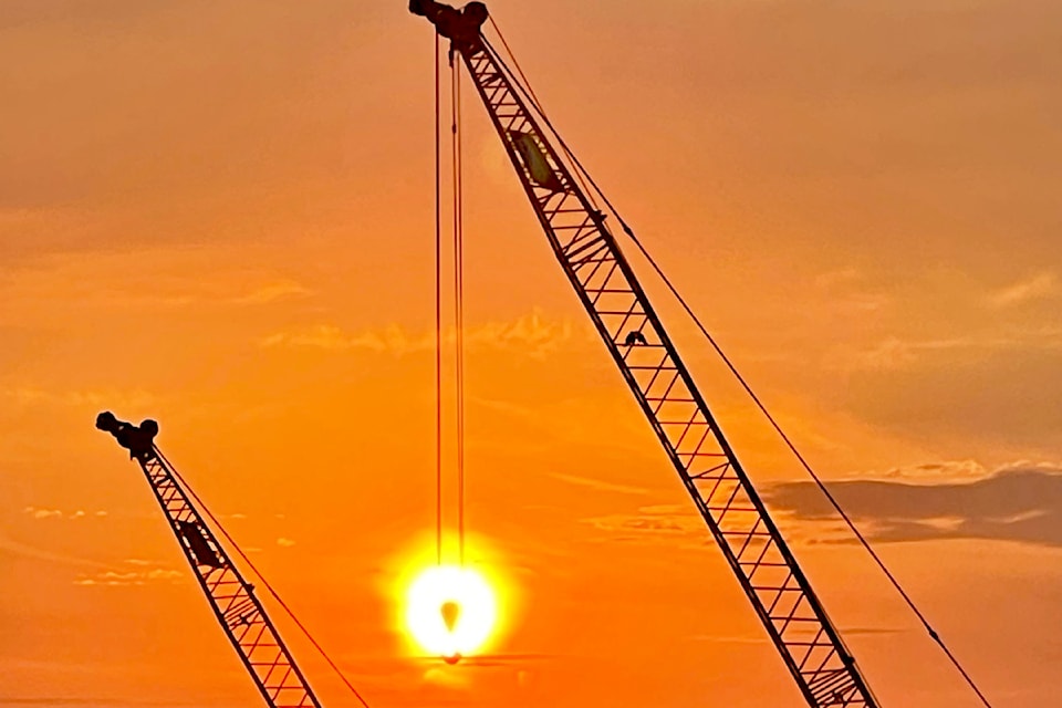 Maple Ridge's Ziggy Welsch captured a recent sunrise, as seen from the Golden Ears Bridge. "Crane giving the sun a helping hand to start the day," shared Welsch.
