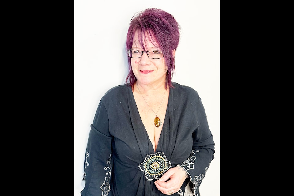 Tina Clelland with the Ridge Meadows Home Show Psychic Fair. 