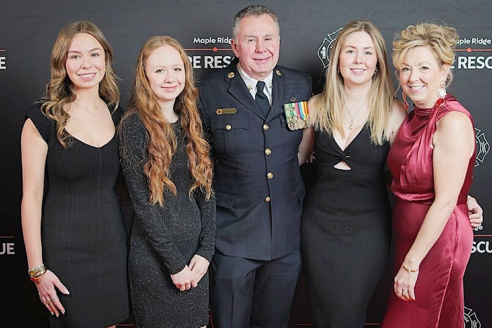 Awards were handed out at a special gathering for Maple Ridge firefighters on Saturday, Feb. 1 at the Albion Community Centre. 
Assistant fire chief Gary Porter with his family. 