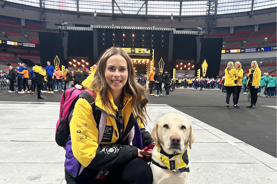 Loki, with primary handler Alysen Cox, is one of 19 dogs from the Pacific Assistance Dogs Society at the Invictus Games.