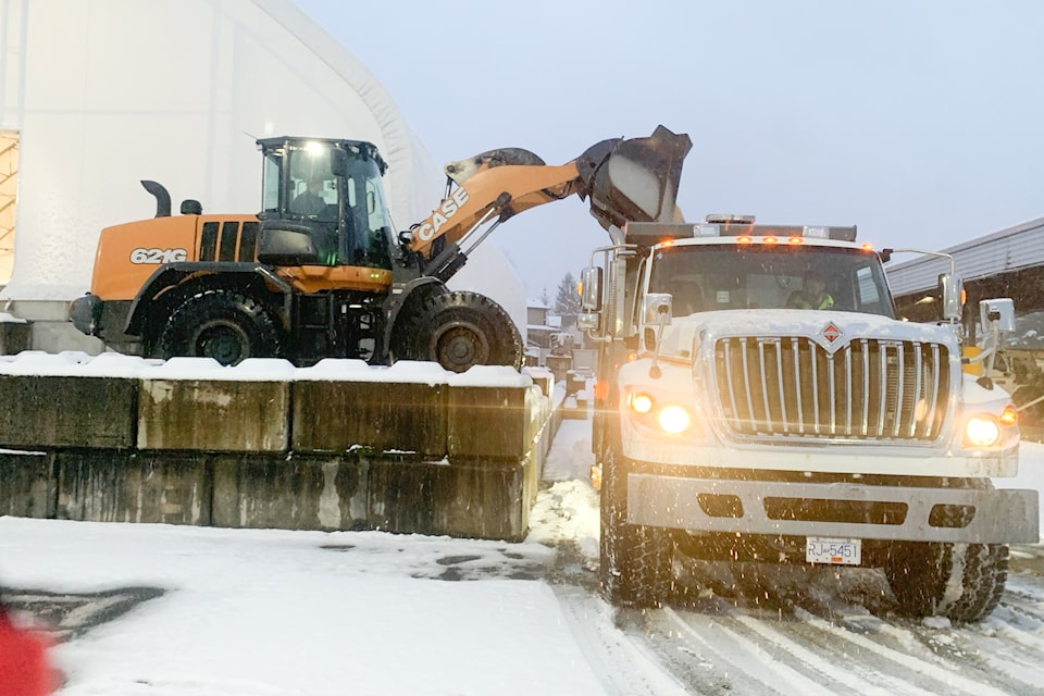 City of Maple Ridge staff clear walkways and roads.