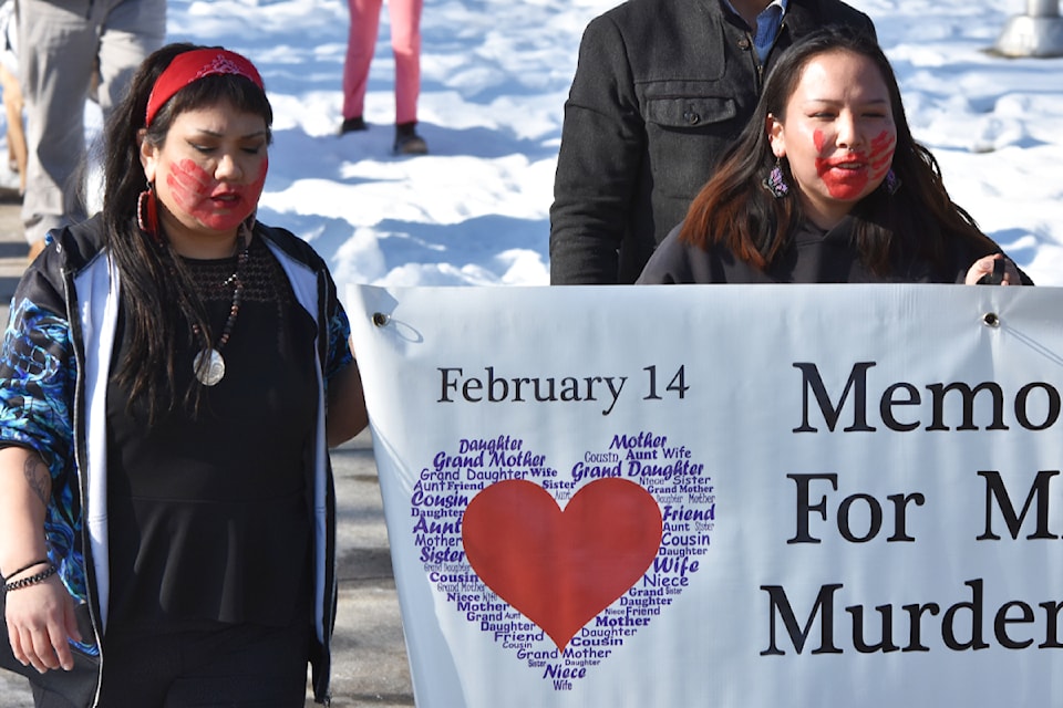 Angelina Roberts and Sonita McKay carried the banner.