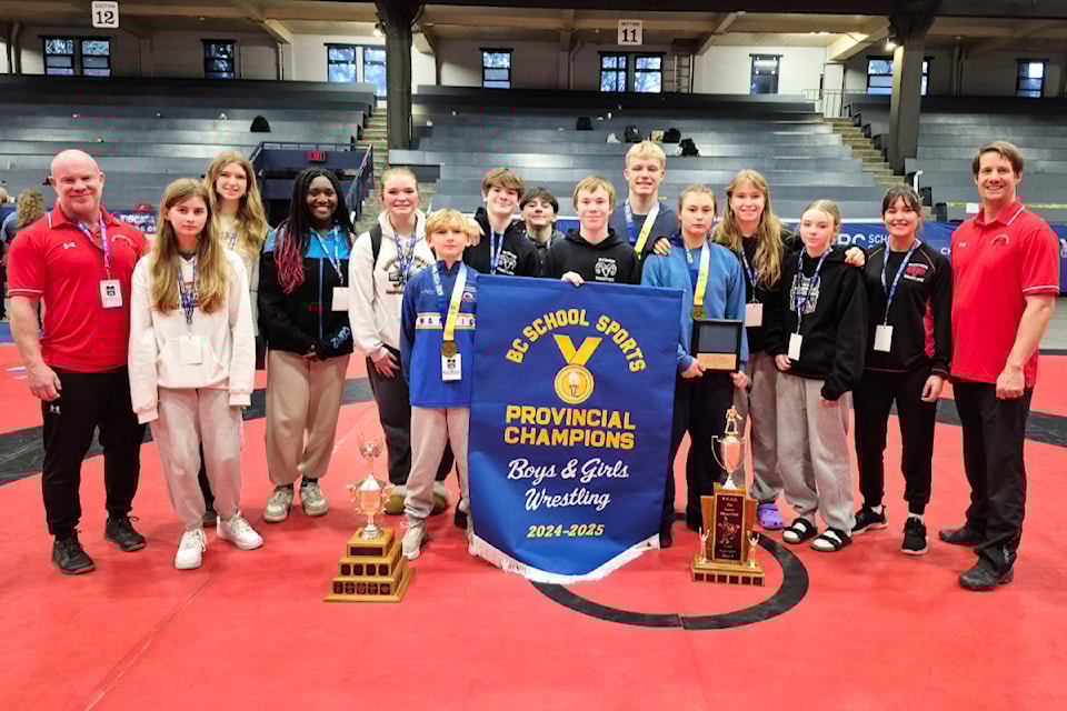 The Ramblers with their championship banner. 