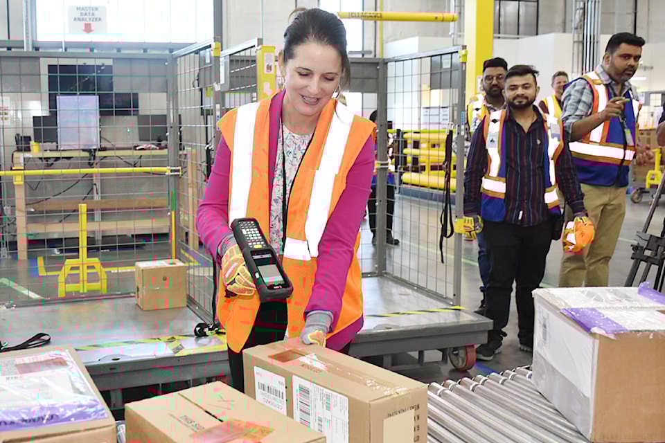 City of Pitt Meadows Mayor Nicole MacDonald toured a new Amazon storage and distribution centre in Pitt Meadows. 