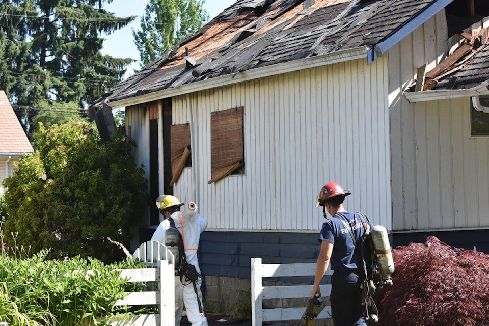 Fire investigators on scene at a house fire in Hammond.