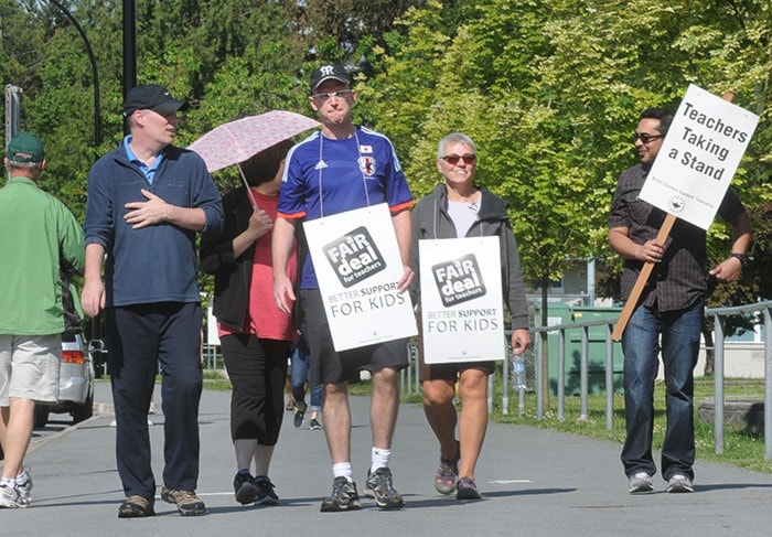 Teachers strike outside of Maple Ridge Secondary Tuesday morning.
05/27/14