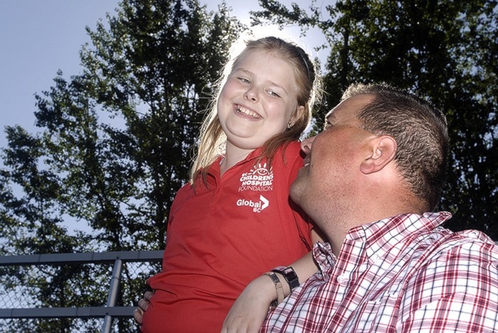 Grace Teboekhorst, 11, with her father Dennis.