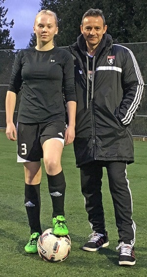 Emma Felgner with her Albion FC coach Steve Pena. Contributed