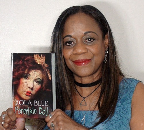 Pitt Meadows resident Zola Blue with her debut novel Porcelain Doll.
