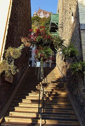 Typical stairs with Chateau Frontenac showing at the top.