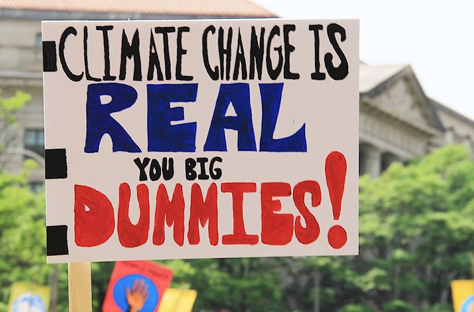 7922041_web1_People-s_Climate_March_2017_in_Washington_DC_21_-_Sign_-Climate_change_is_real_you_big_dummies-