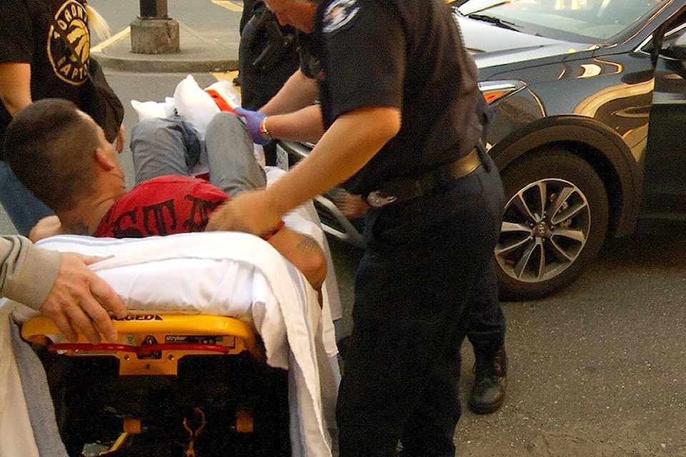 Charges laid against man who jumped from parkade while fleeing police