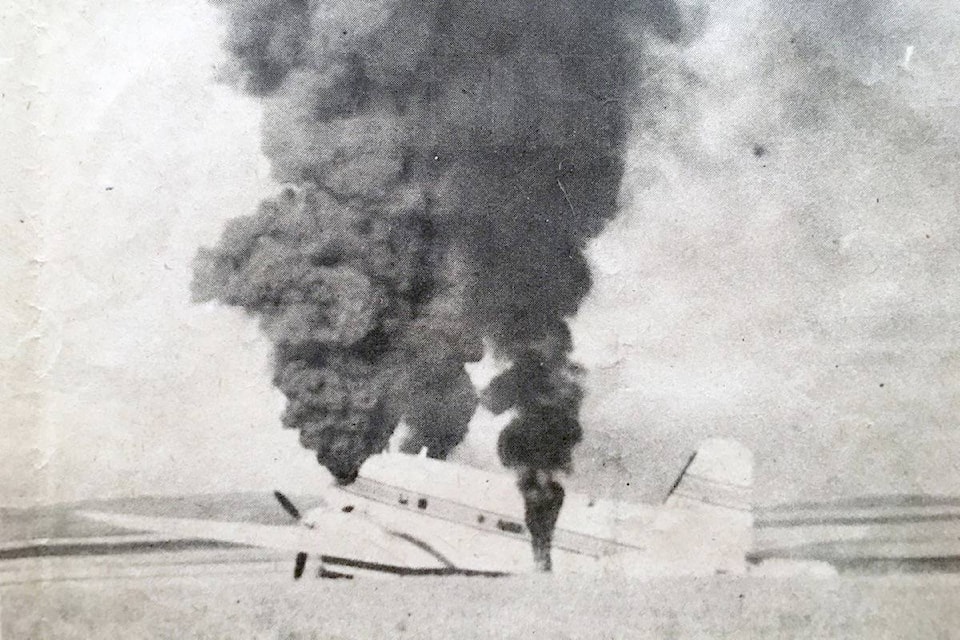 Smoke and flames engulf the Kelowna Flightcraft DC-3 after it crashed in a field near Pincher Creek, Alta. on Sept 8, 1976. (Don Kendall, Vernon Daily News Photo).