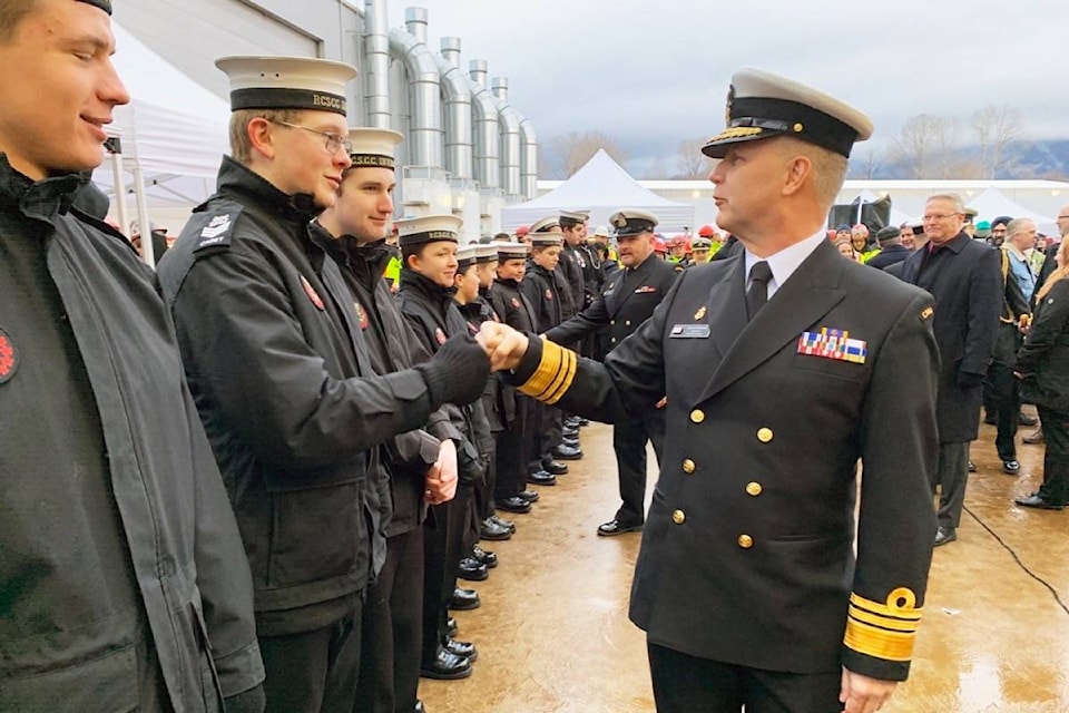 Vice Admiral Art McDonald fist bumps with Cadet Petty Officer Second Class Michael Bray as he meets cadets from RCSCC Invincible on January 16th at Seaspan’s Vancouver Shipyard. (Photo by Lt(N) Kevin Deck)