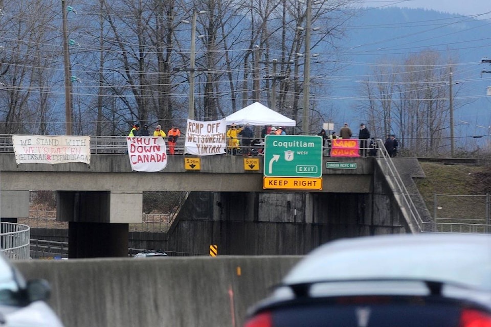 20555120_web1_200219-MRN-PM-trainsstopped-protest_2