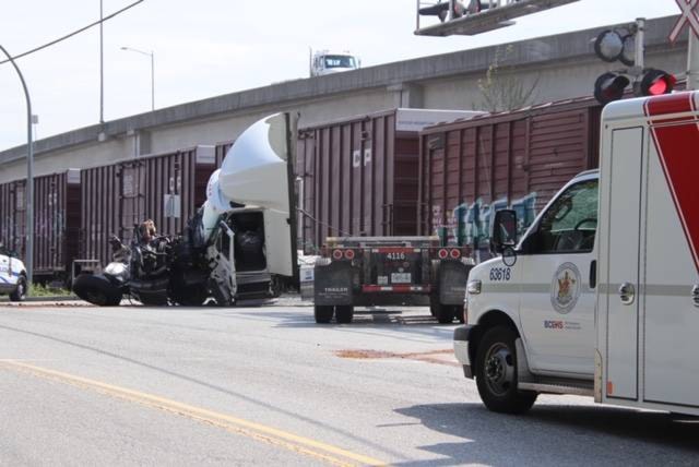 A train collided with this semi-truck in Port Kells April 20. The truck driver only suffered minor injuries in the collision, but was taken to the hospital “out of an abundance of caution,” said the Langley RCMP. (Photo: Shane MacKichan)