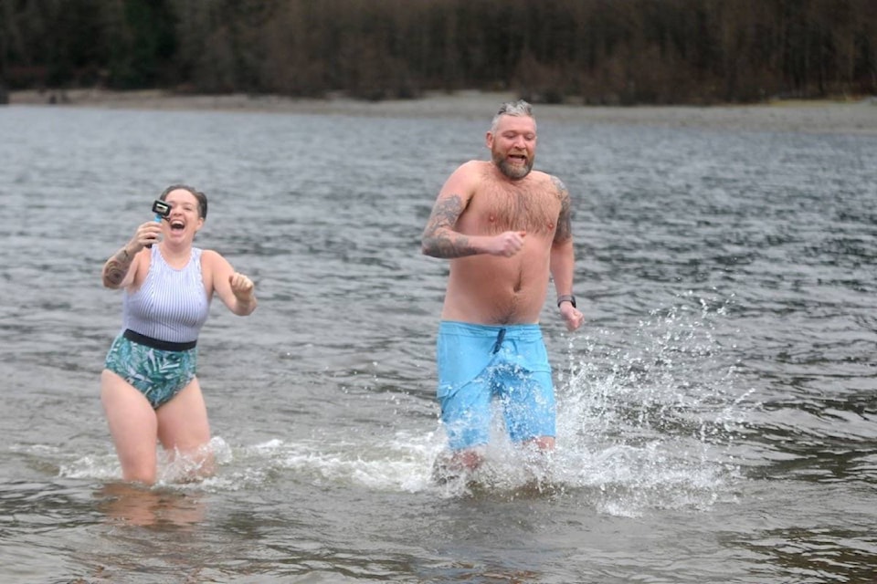 Rachel and Ryan Neufeld plunged into Alouette Lake for the New Year. (Colleen Flanagan/The News)