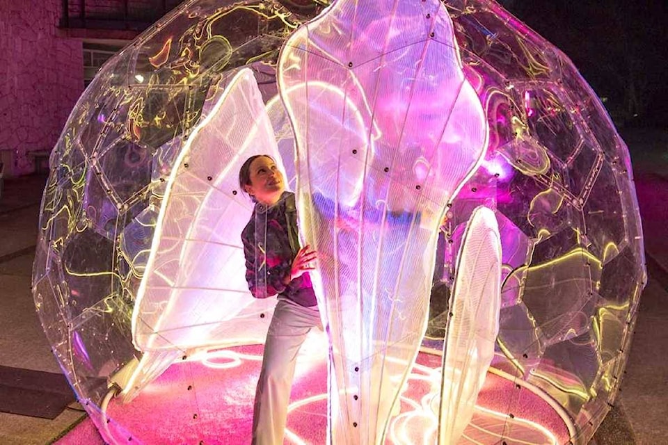 Japanese-Canadian dancer Jennifer inside a newly-installed “dance bubble,” part of Tourism Vancouver’s latest effort to draw locals back to the downtown core. (Small Stage)