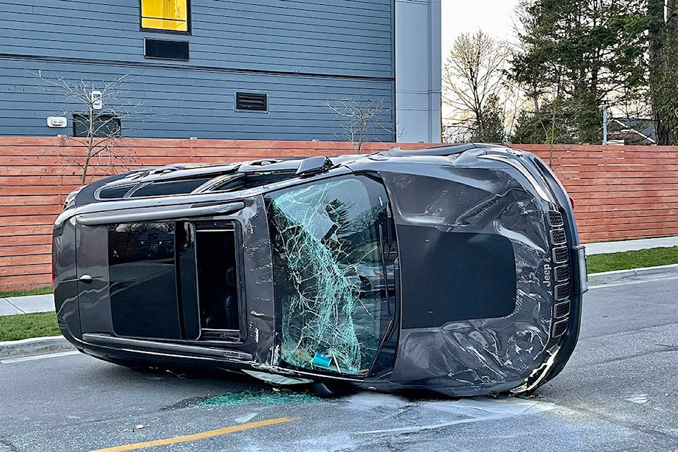 Ridge Meadows RCMP were called to a rollover crash on Burnett Street in Maple Ridge around 7 p.m. on Wednesday, March 17. The lone occupant was not injured, but was issued a violation ticket for driving without due care and attention. (Ziggy Welsch/Special to The News)