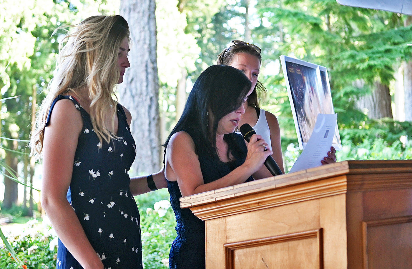 Alina Durham, mother of 23-year-old Shaelene Bell, reads a poem during her daughters celebration of life at Sandpiper Resort on Saturday, June 26, 2021. (Jenna Hauck/ Chilliwack Progress)