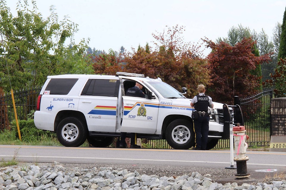 The discovery of a body drew a large police presence in Pitt Meadows on Aug. 15, 2021. (Shane MacKichan/Special to The News)