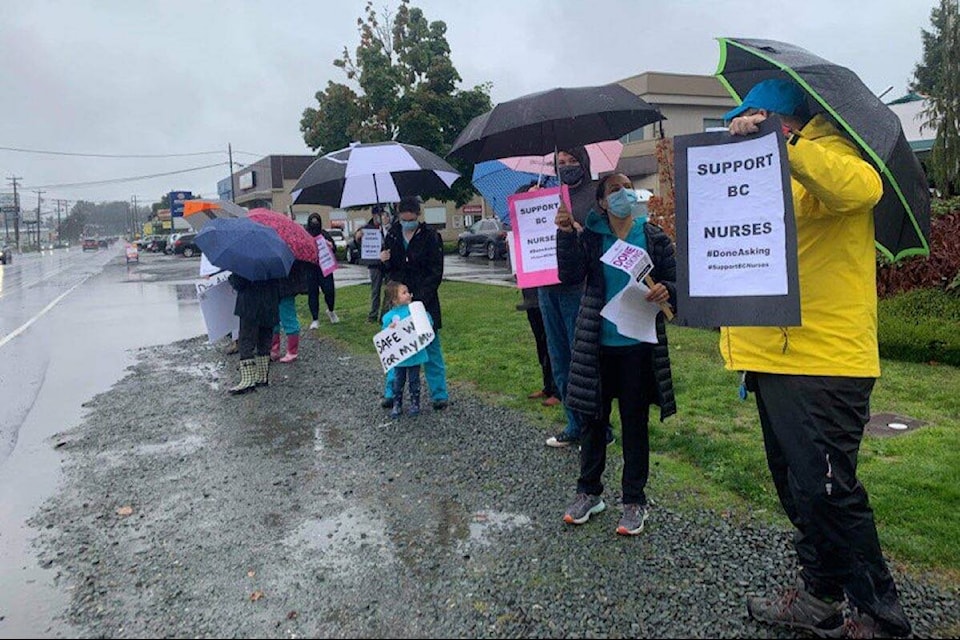 Nurses and supporters rally over staffing shortages and working conditions outside Chilliwack MLA Dan Coulter’s office on Sept. 17, 2021. (Margaret Reid photo)