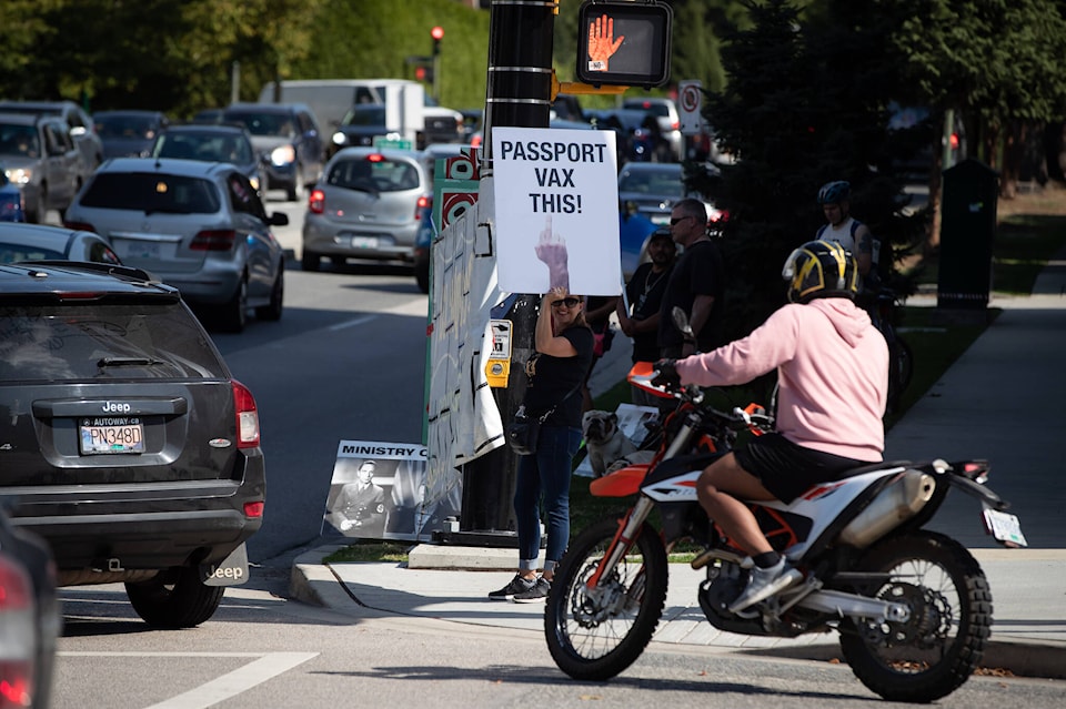 26610366_web1_210924-CPW-Small-business-backlash-vax-cards-protest_1