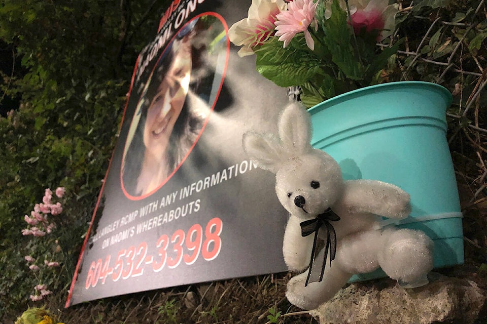 Some people have left flowers, a stuffed rabbit and a painted stone near the home of Naomi Onotera. (Heather Colpitts/Langley Advance Times)