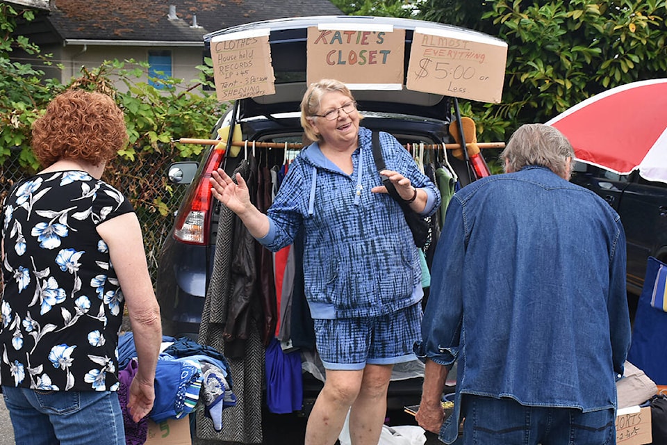 Katie’s Closet features lots of used clothing at the Carboot Sale in Maple Ridge on Saturday. (Neil Corbett/The News)