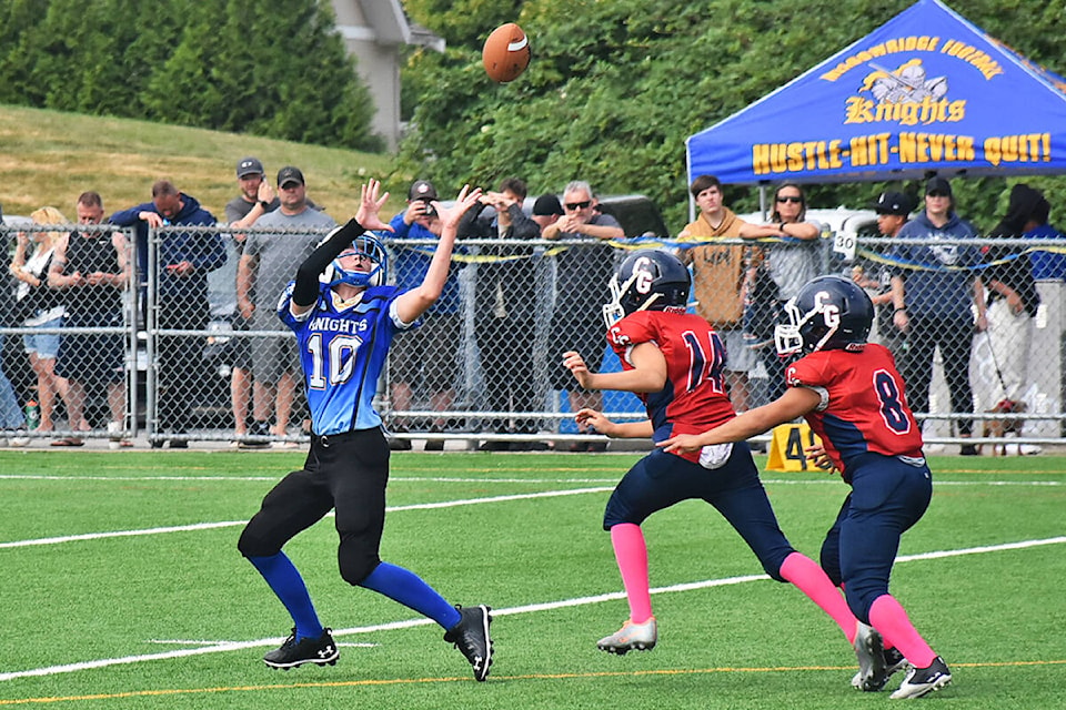 Knights receiver Coleton Chartier blew past coverage and caught this pass for a long catch-and-run touchdown. (Neil Corbett/The News)