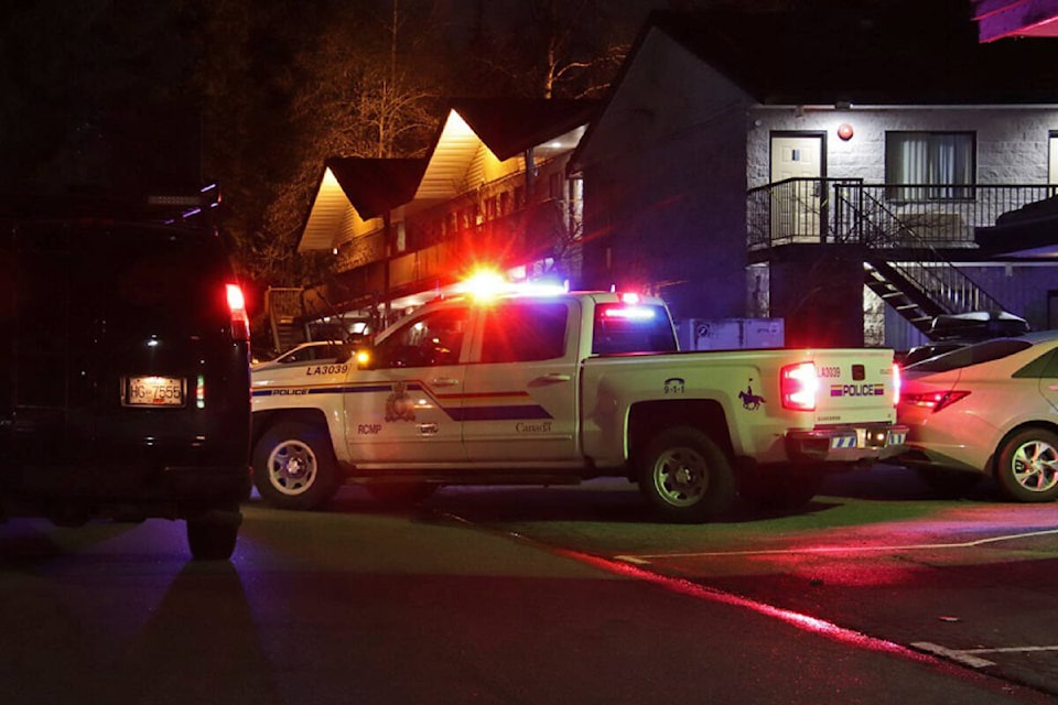 A large police presence at the Langley Highway Hotel in Walnut Grove was noted Friday night, March 25, 2022. It was later confirmed that it was a murder. Six months later someone has been arrested and charged with second-degree murder. (Shane MacKichan/Special to Langley Advance Times)