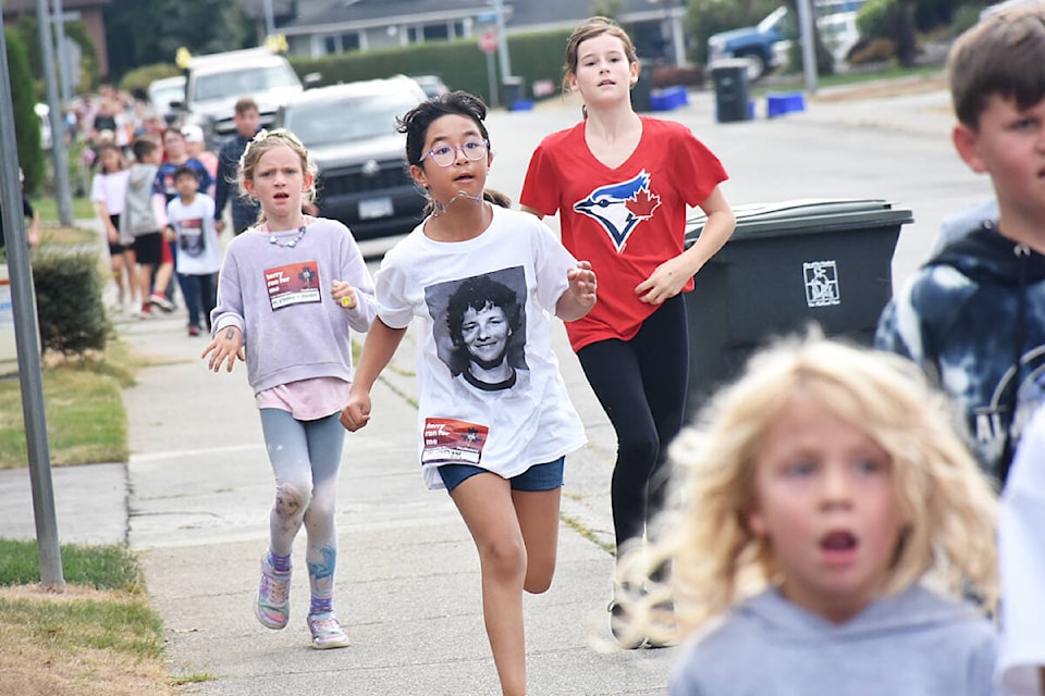 Grade 4 student Zara Madadi, center, is flanked by Grade 2 student Hannah Dove on her left, and Grade 7 student Vanessa Crowe, on her right, during the Davie Jones elementary Terry Fox Run on Wednesday, Sept. 28. (Colleen Flanagan/The News) Cohen Cook Grade 6 (tie dye sweatshirt)