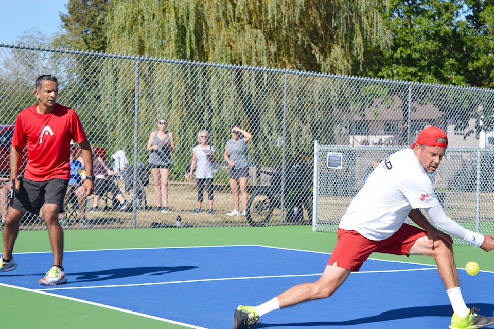 Steve Deakin (right) and Robin D’Abreo (left) are both professional pickleball players that played at the open house event at Pitt Meadows Athletic Park. (Brandon Tucker/The News)