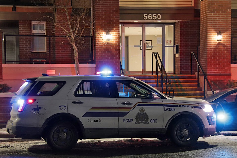 Two people are in hospital and one person is in police custody following a violent incident at a Langley City multi-unit residential building on Friday afternoon, Dec. 2. (Shane MacKichan/Special to Langley Advance Times)