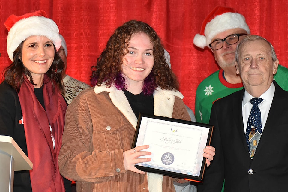 Community Service Youth Award winner Ruby Gibb with Mayor Nicole MacDonald and John Barnes (right) who served on the awards task force. (Neil Corbett/The News)