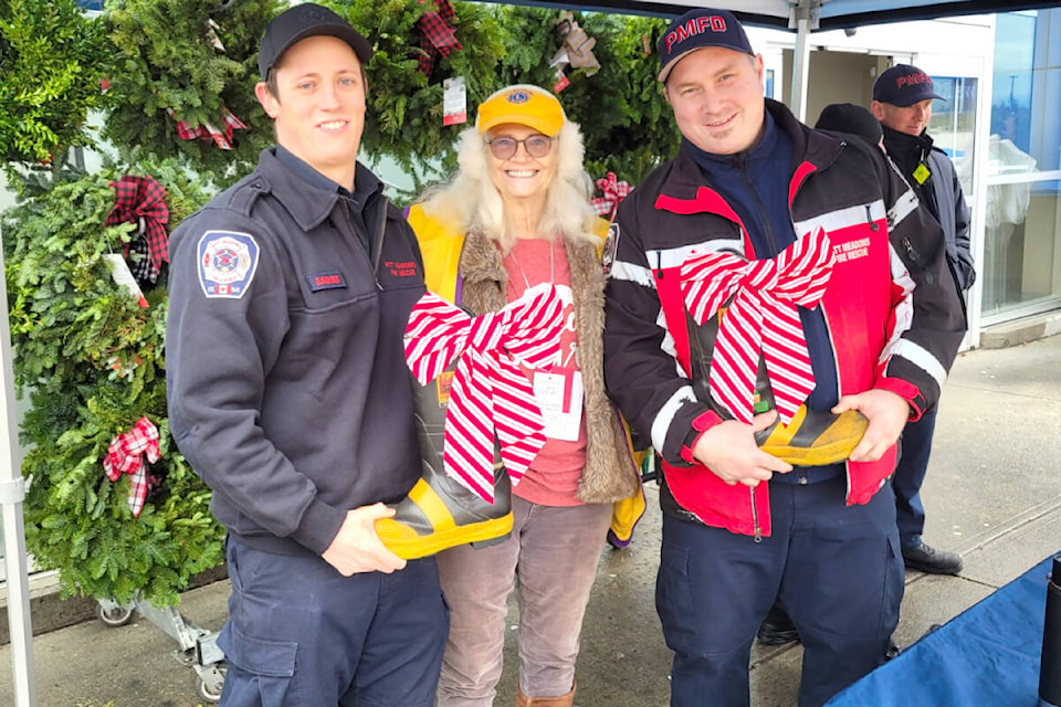 Members of the Pitt Meadows Fire & Rescue team were stationed all throughout the city on Saturday, Dec. 10 as part of the Firefighters for Families fundraising campaign. (Special to The News)