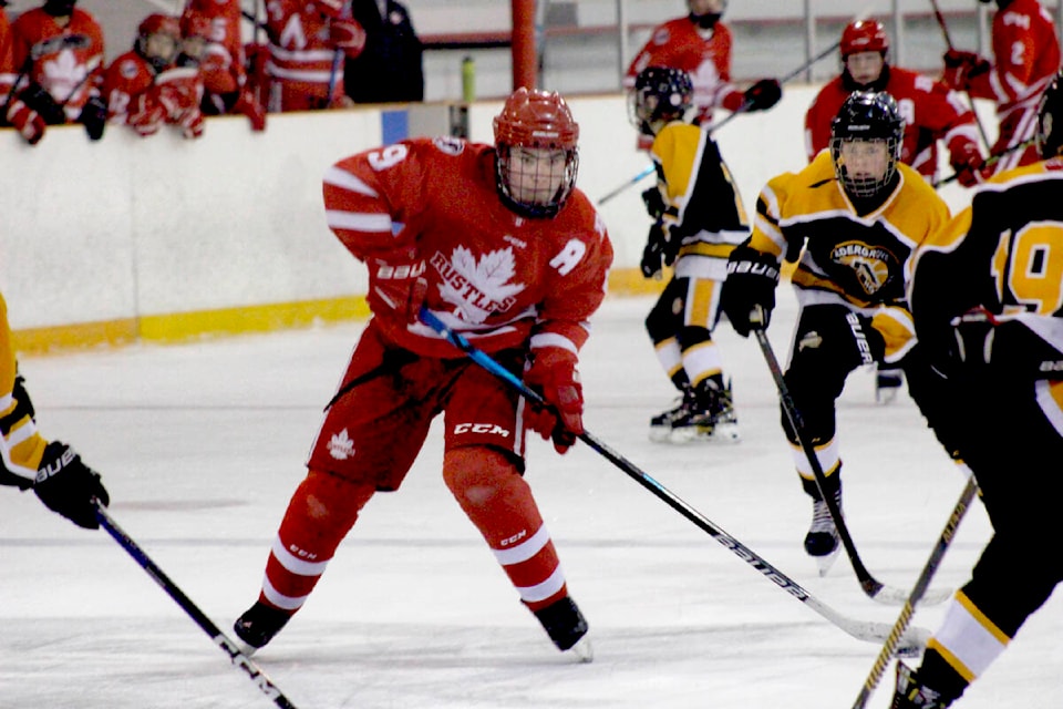 31470150_web1_230103-MRN-BT-HometownHeroesHockey_3