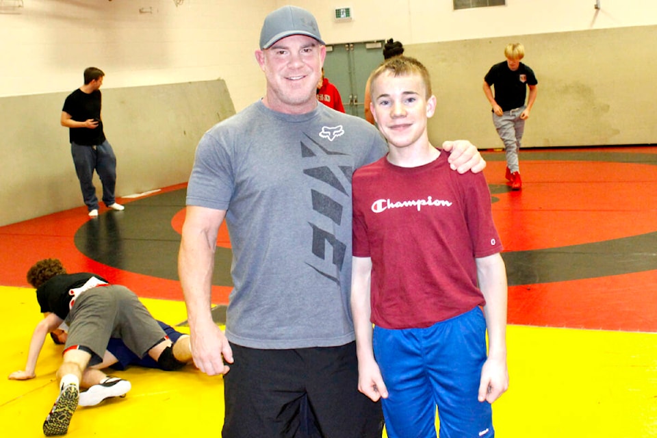 31704483_web1_230128-MRN-BT-FatherSonWrestlers_2