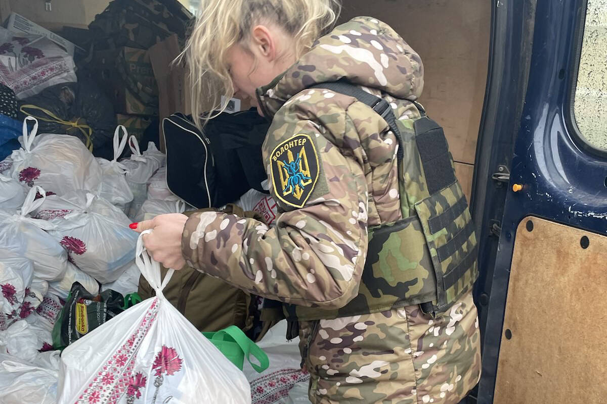 April Huggett giving out food in Bakhmut, Ukraine. Photo: Submitted
