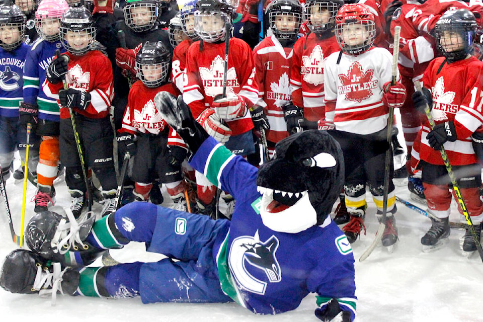 The Vancouver Canucks mascot, Fin, stopped by Planet Ice on March 24 to skate around with the children and record a promotional video for Kraft Hockeyville. (Brandon Tucker/The News)
