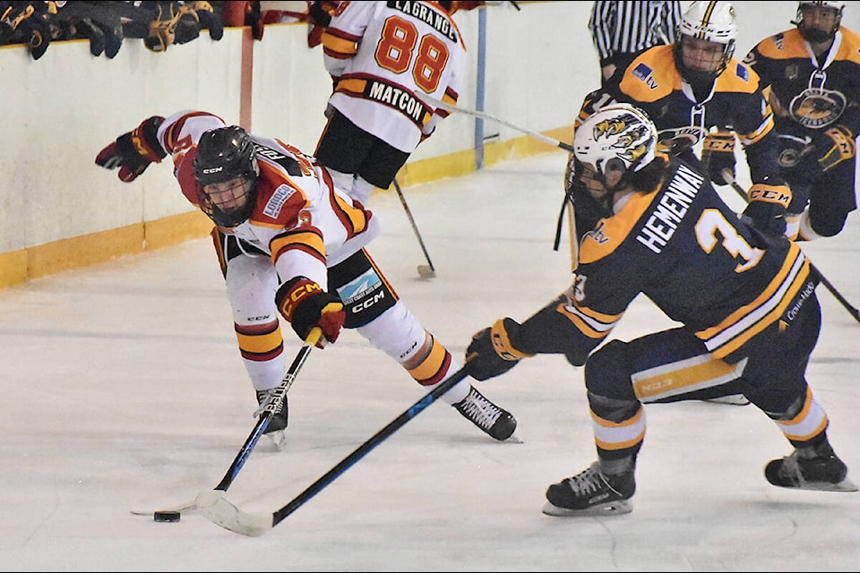 Jack Foster on the forecheck for the Ridge Meadows Flames. (Neil Corbett/Maple Ridge News)