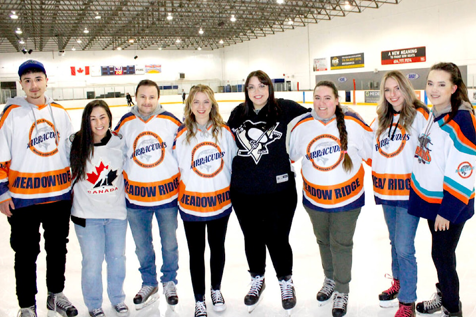 Ashley Fedyk (4th from right) organized a memorial skate at Planet Ice for her father, Joe Legassic, on March 25. (Brandon Tucker/The News)