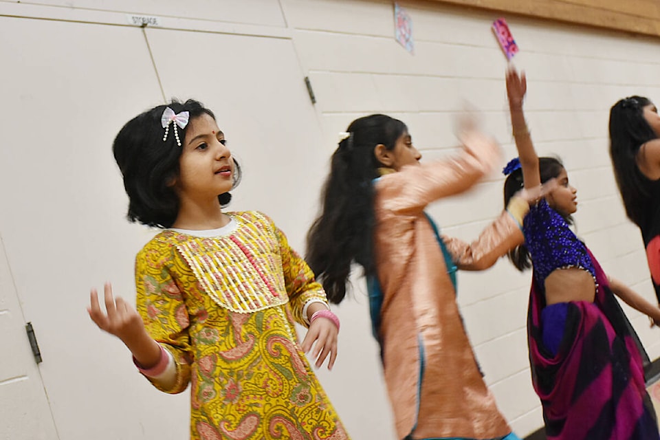 Students at Harry Hooge Elementary demonstrate a dance for the festival of Holi, a Hindu celebration most commonly known as the Festival of Colours. (Colleen Flanagan/The News)