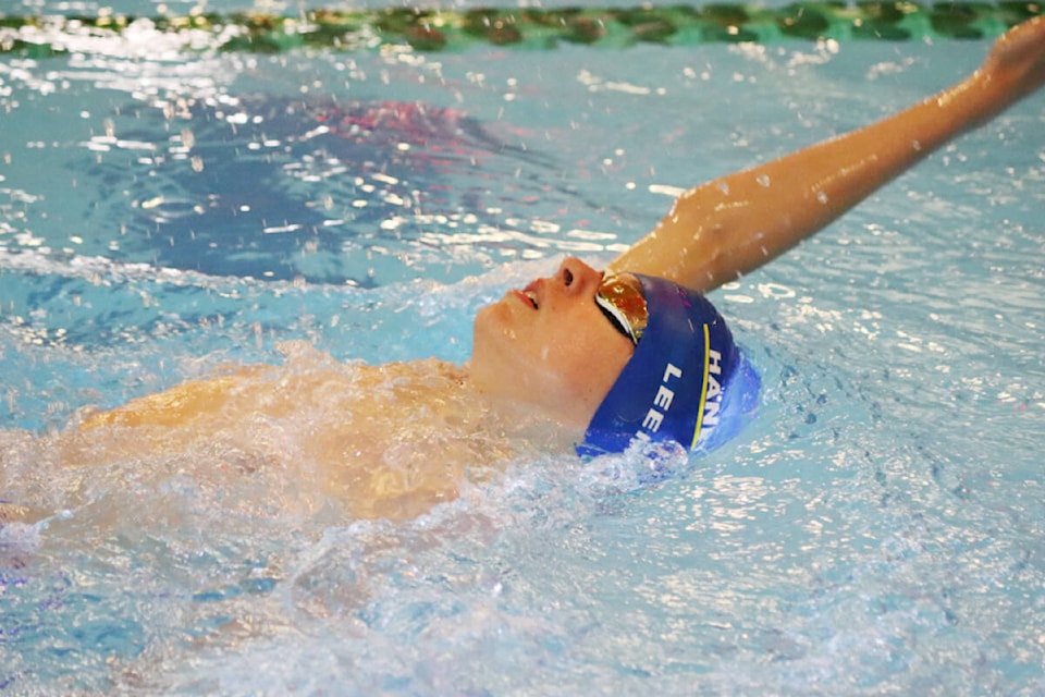 A member of the Haney Neptunes competes in the boys division four 100 backstroke at the Mission Marlins Invitational. (Amandalynn Grozdanich/Special to The News)