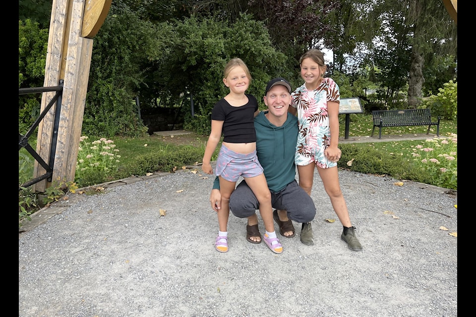 Graeme MacRury (middle) and his two daughters Paisley (right) and Tenley (left) support and raise funds for the annual Cops For Cancer campaign. They became involved after Paisley was diagnosed with Leukemia at the age of four.
