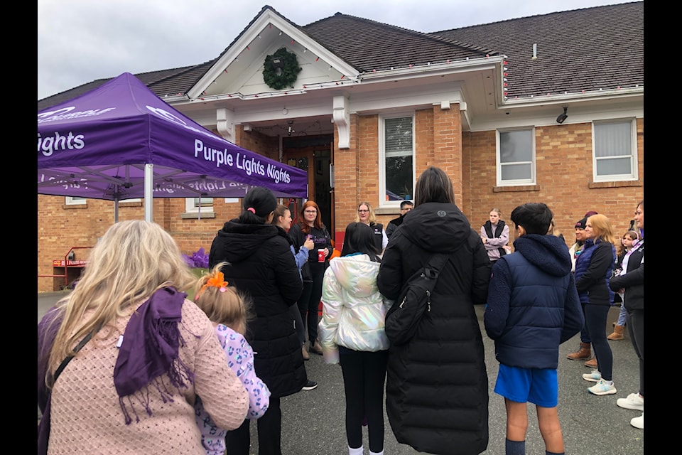 Participants in the Purple Lights Nights community walk in Mission on Oct. 26 trekked from the SARA For Women building to the Mission Friendship Centre.  