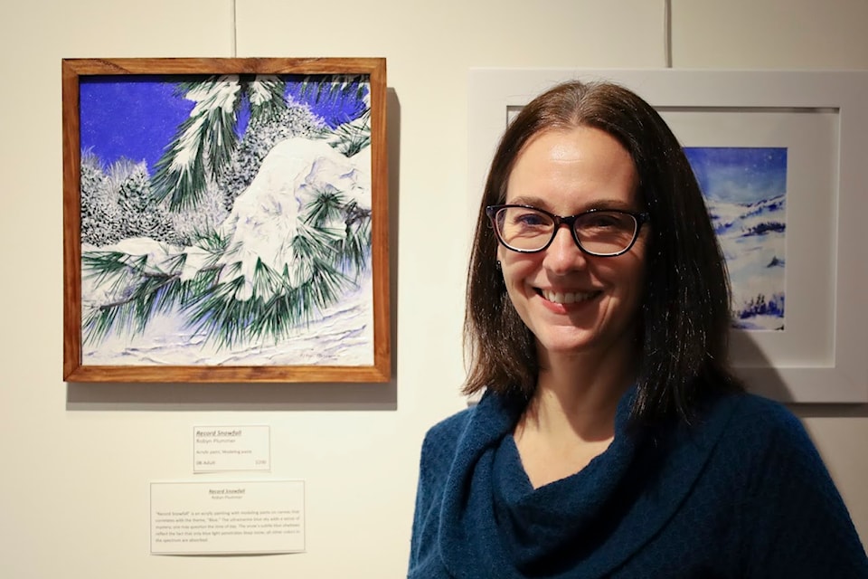 The Peggy Staber Memorial Art Show held its opening reception on Saturday with the gallery open until Jan. 18. Robyn Plummer (pictured) received an honourable mention for the "Record Snowfall" acrylic. 