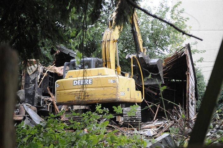A house destroyed in a fire Monday was demolished the following day.